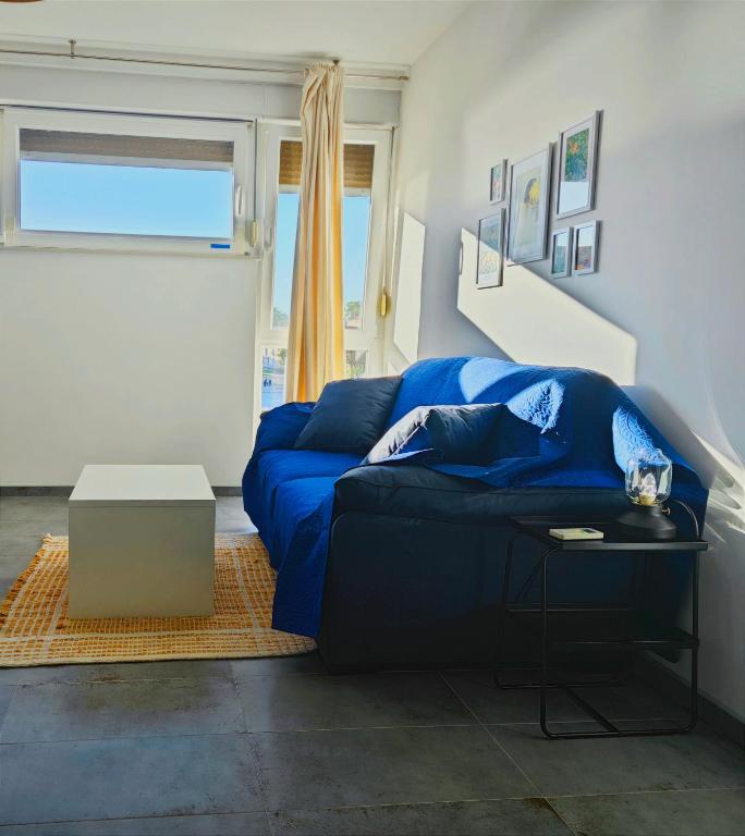 Posedenie v ubytovaní Cozy Old Town Apartment