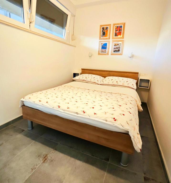 Posteľ alebo postele v izbe v ubytovaní Cozy Old Town Apartment