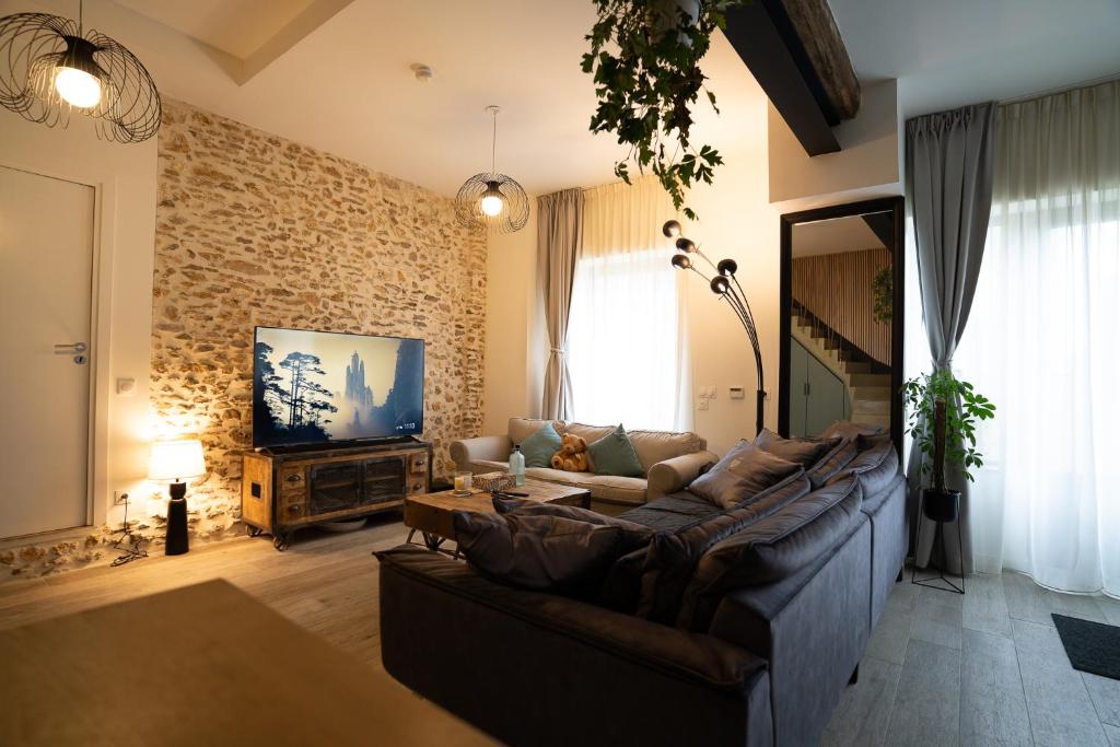Μια τηλεόραση ή/και κέντρο ψυχαγωγίας στο Jolie maison dans la forêt