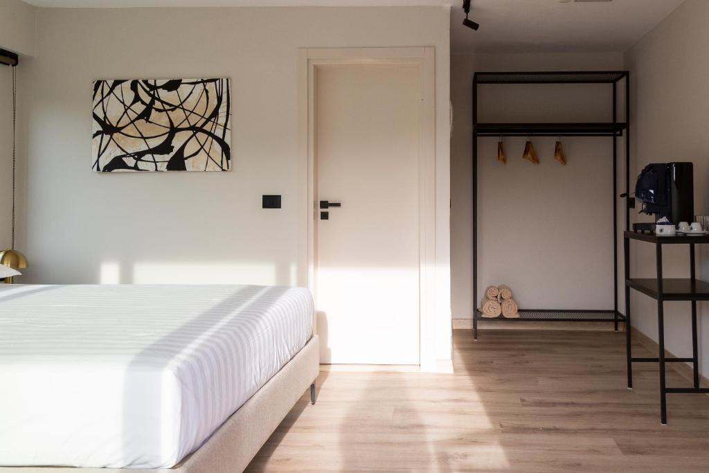 Postel nebo postele na pokoji v ubytování Garden Inn