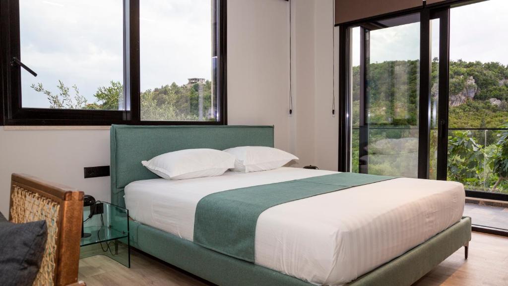 Postel nebo postele na pokoji v ubytování Garden Inn