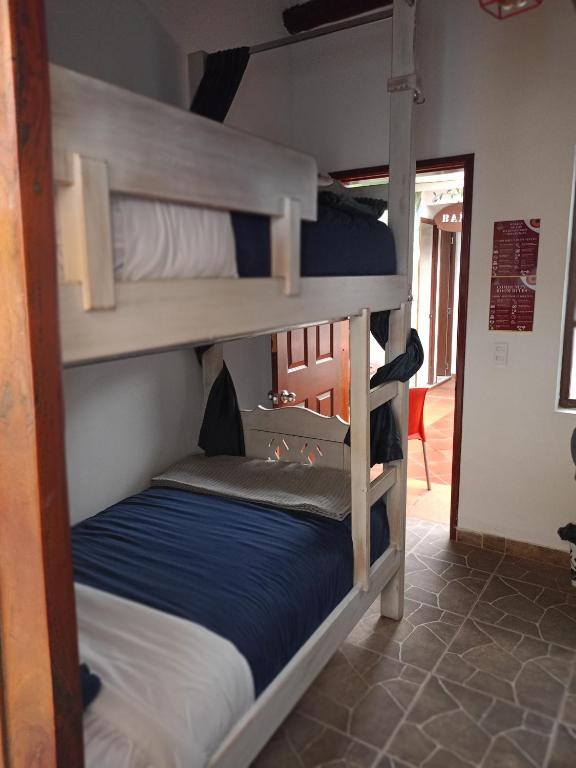 Postel nebo postele na pokoji v ubytování Usaquen Station Hostel