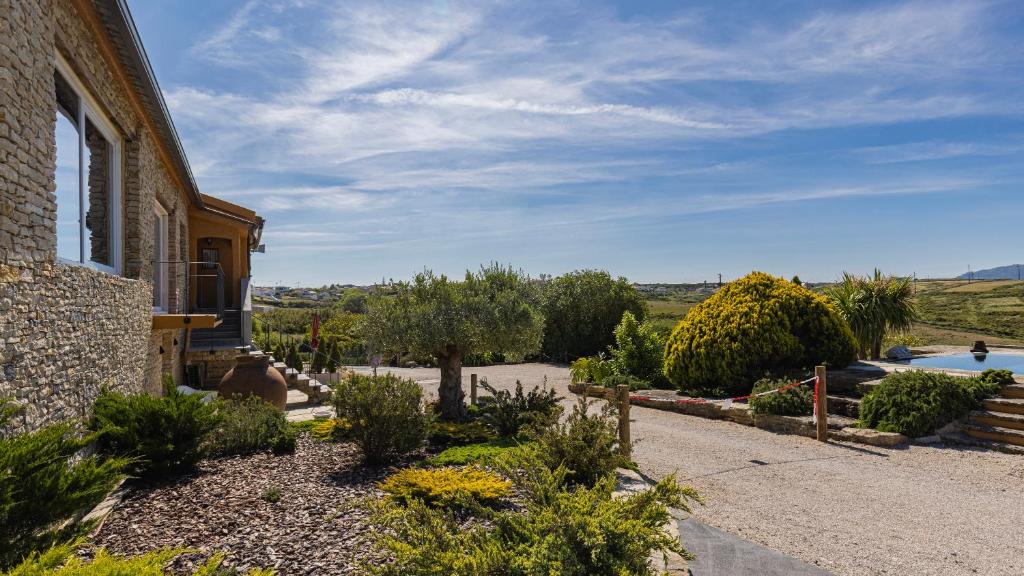 a house with a garden in front of it at Kochab Sintra by LovelyStay in Sintra