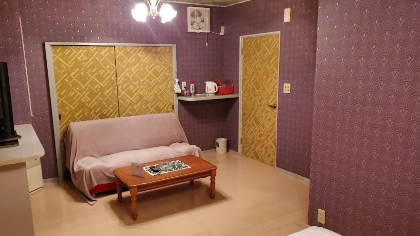 Postel nebo postele na pokoji v ubytování ホテル夢の里