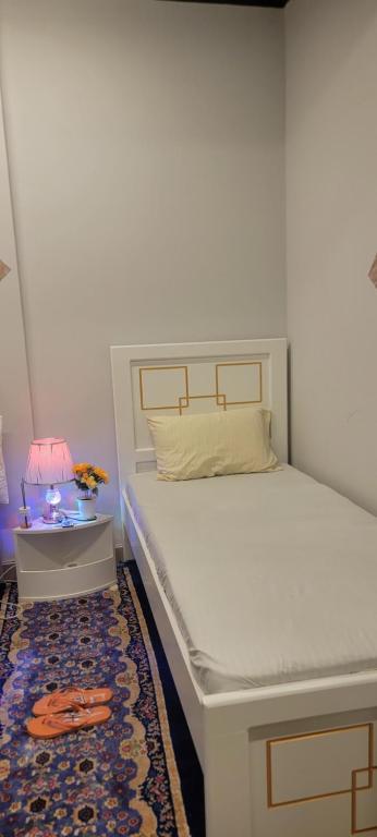 Postel nebo postele na pokoji v ubytování Home Away Apartment