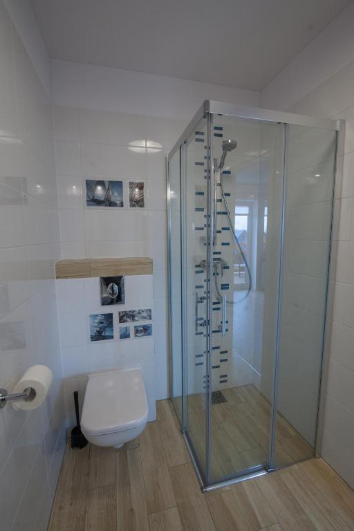 Koupelna v ubytování Lazur Apartamenty Domki