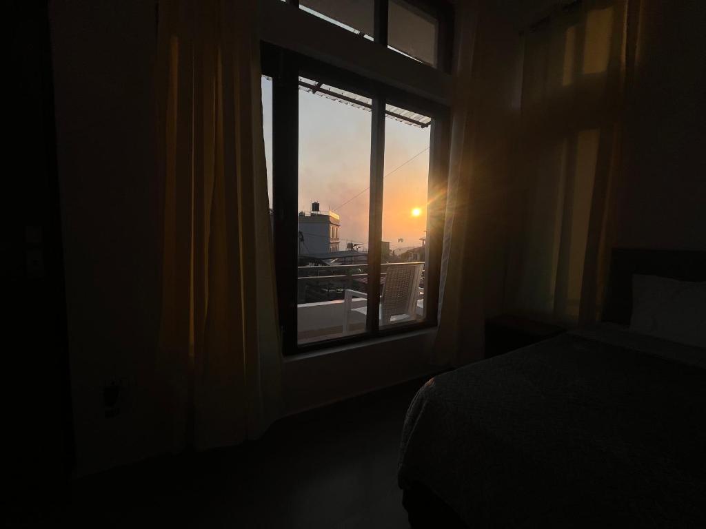 Postel nebo postele na pokoji v ubytování House Of Views Bir