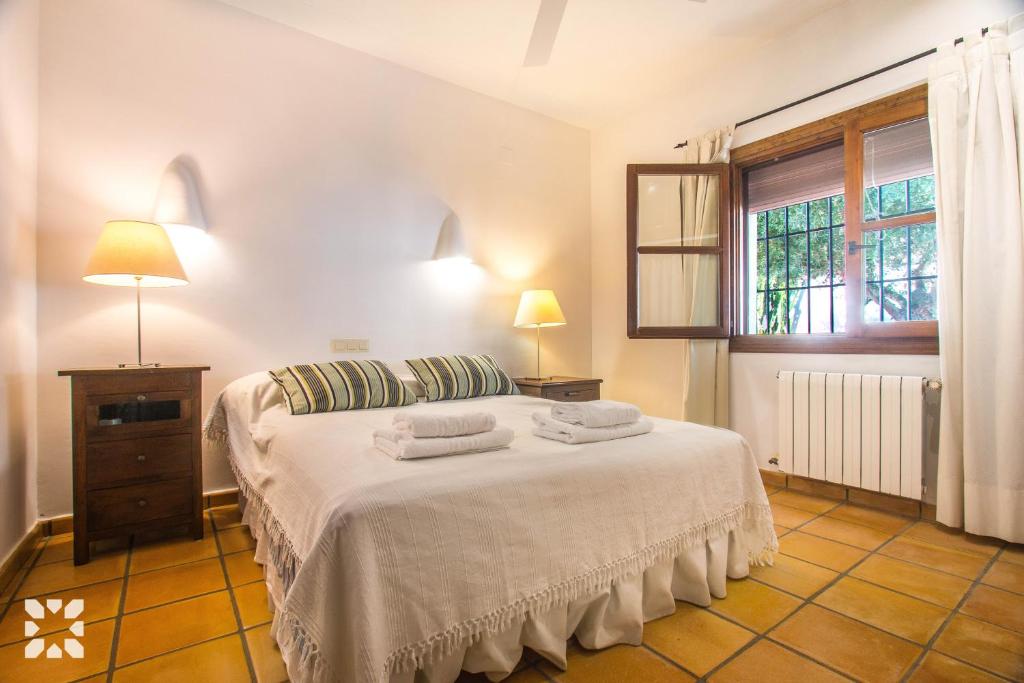 Postel nebo postele na pokoji v ubytování Villa Las Salinas by Abahana Villas