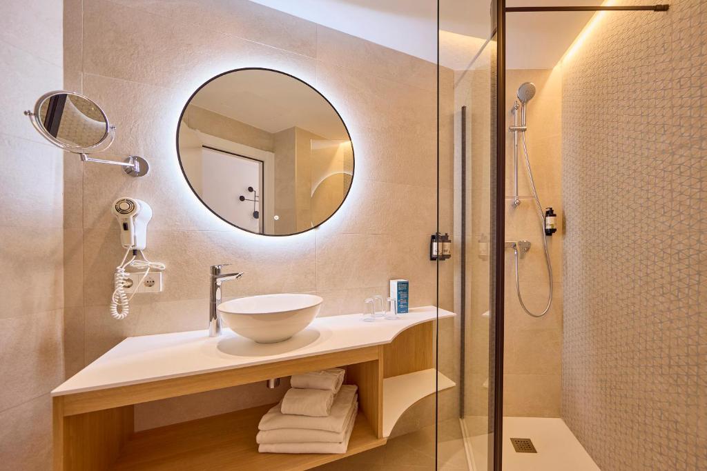 Koupelna v ubytování Universal Hotel Bikini