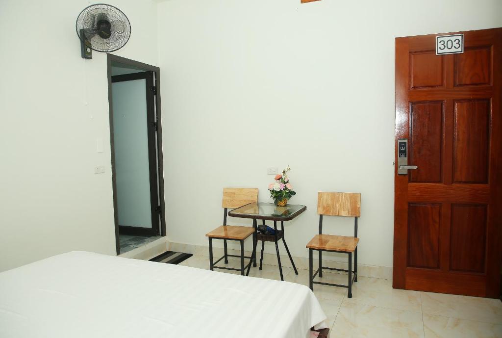 Postel nebo postele na pokoji v ubytování THUY DUNG TAM COC HOMESTAY