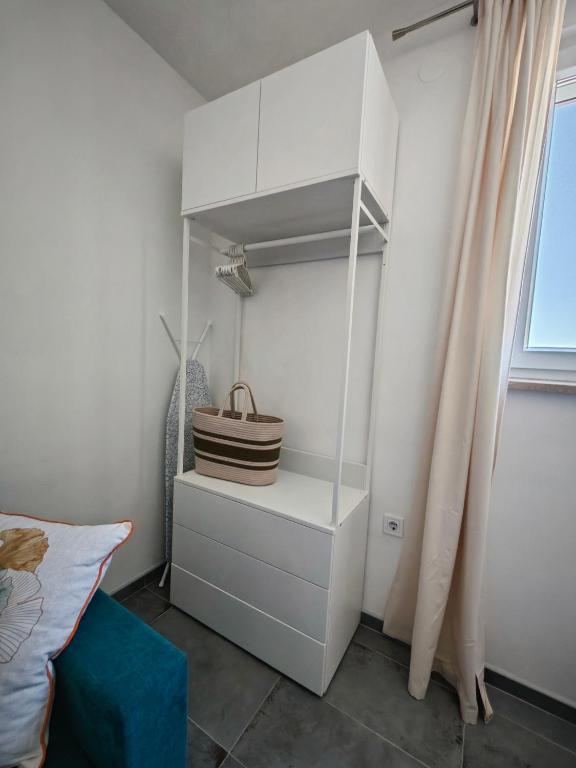 Posteľ alebo postele v izbe v ubytovaní Cozy Old Town Apartment