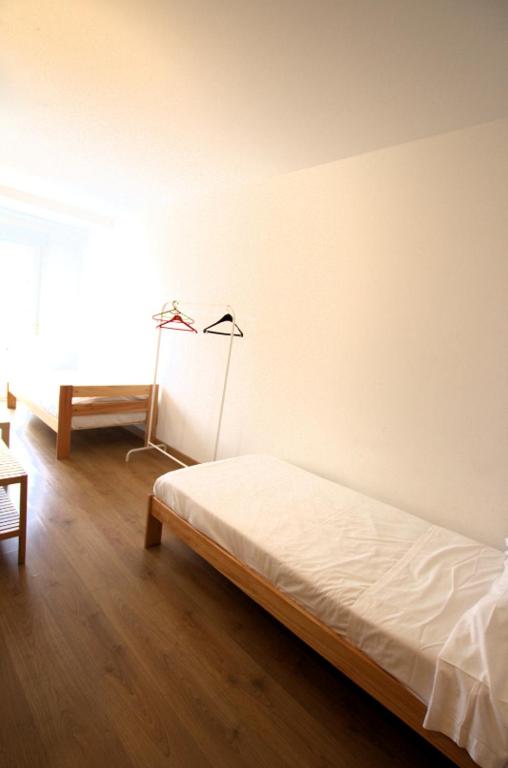 Postel nebo postele na pokoji v ubytování APARTAMENTO LABEGAIN 2