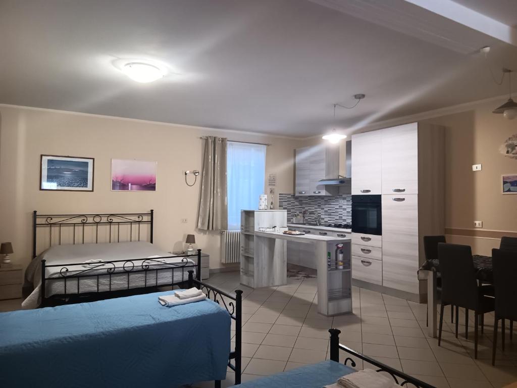 Kuchyňa alebo kuchynka v ubytovaní casa vacanze iris, appartamento turistico