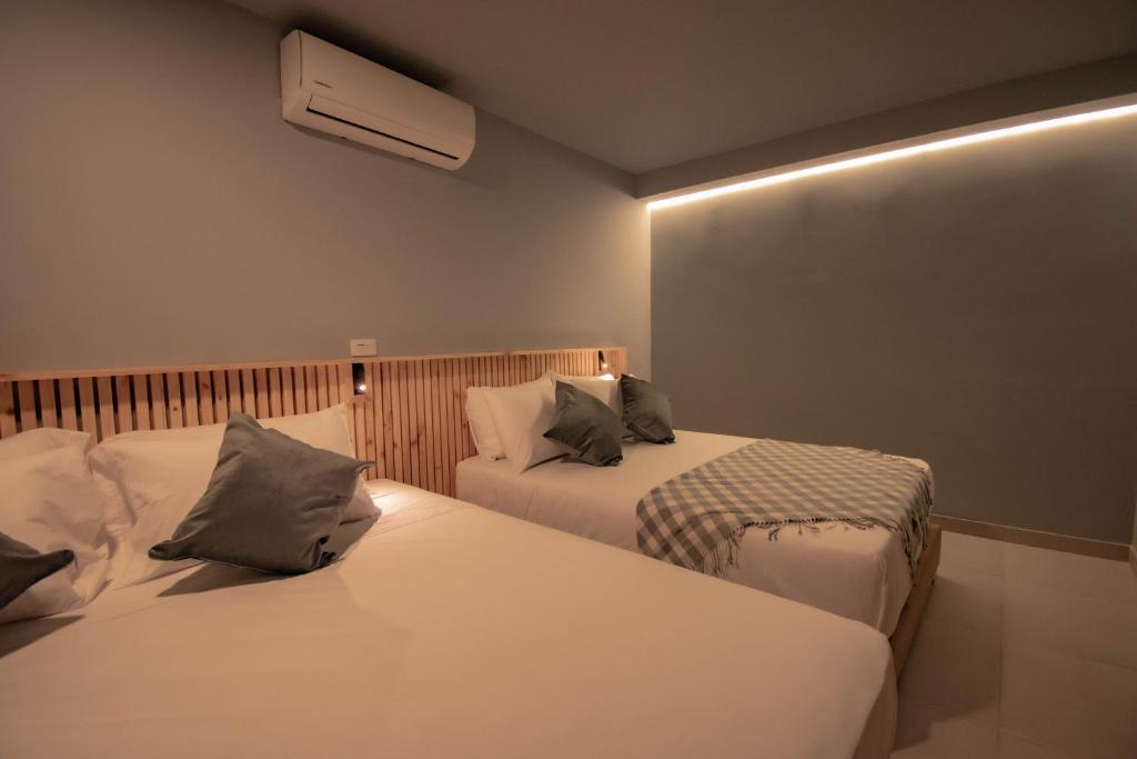 Postel nebo postele na pokoji v ubytování Leviu by Bernalo Hotels