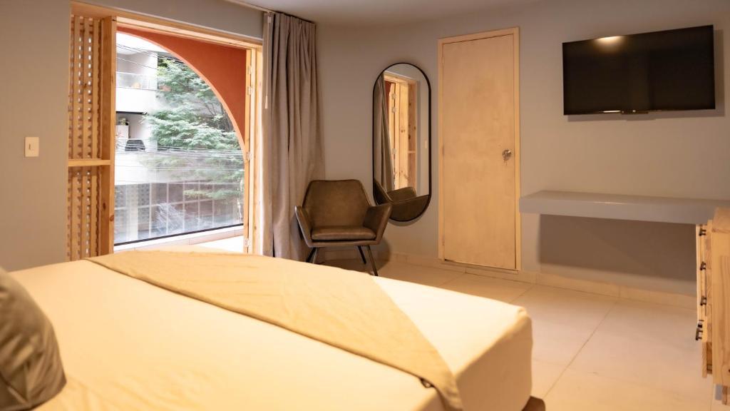 Postel nebo postele na pokoji v ubytování Leviu by Bernalo Hotels