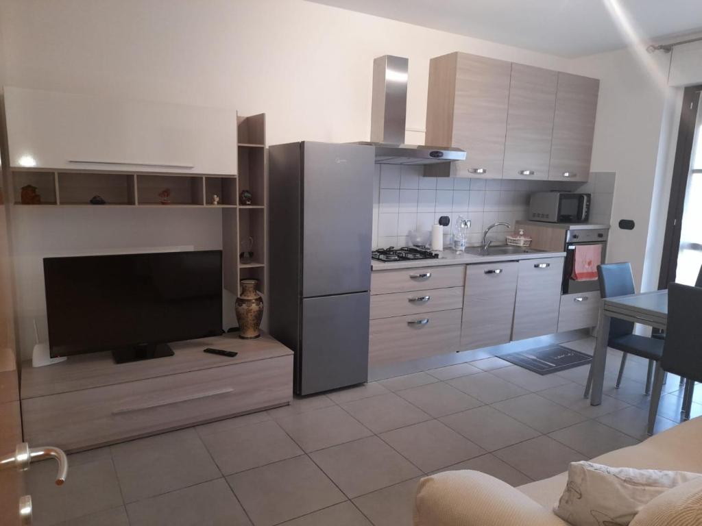Kuchyň nebo kuchyňský kout v ubytování Relax Preserasca-Modern Apartment-BORGO MERCATO-MONCALIERI