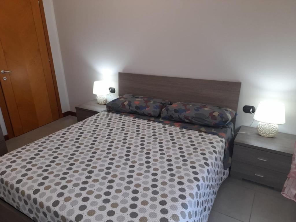 Postel nebo postele na pokoji v ubytování Relax Preserasca-Modern Apartment-BORGO MERCATO-MONCALIERI