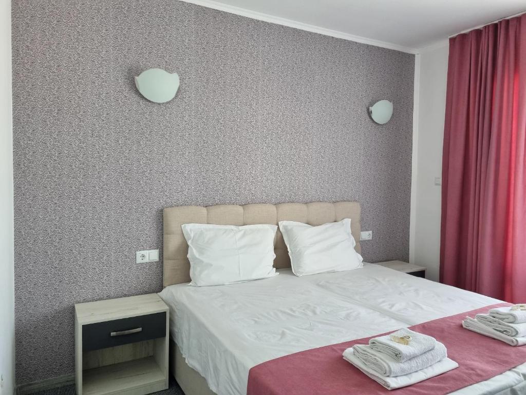 Postel nebo postele na pokoji v ubytování Dani beach Sozopol