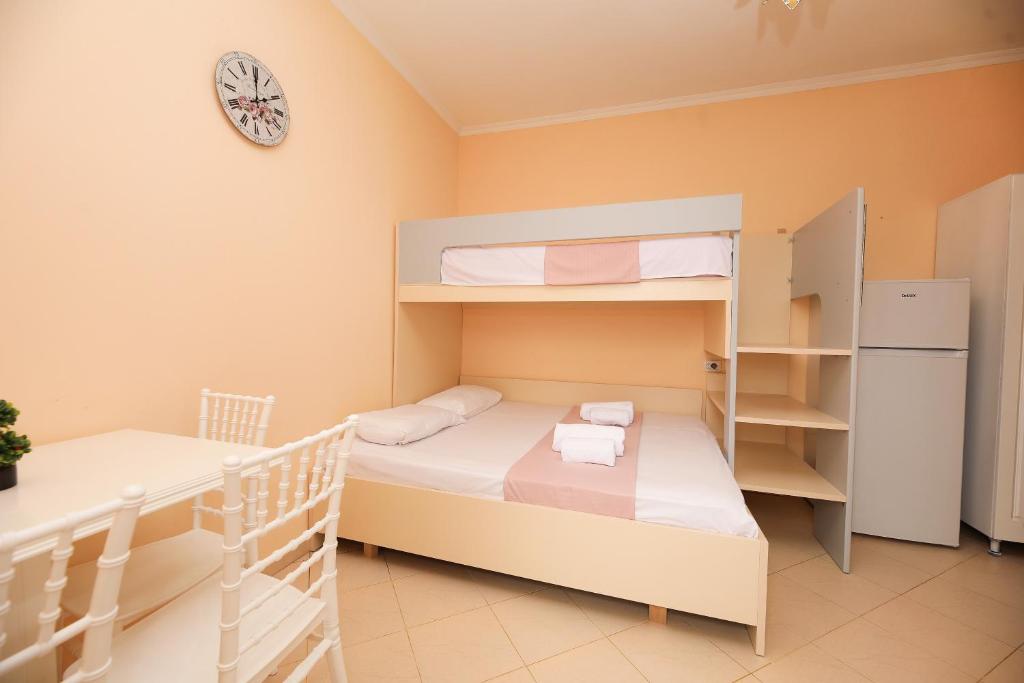 Postel nebo postele na pokoji v ubytování Vila Feliz - Premium Rooms with Free Private Parking