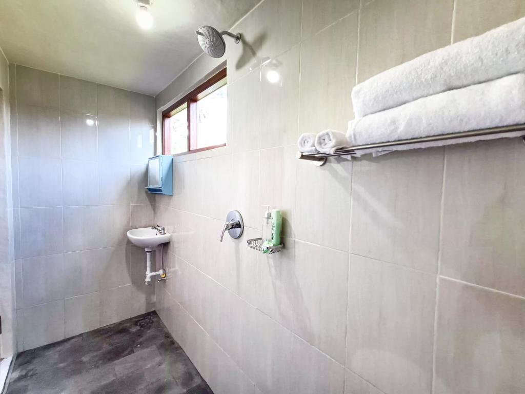 Koupelna v ubytování Wisuda Guest House
