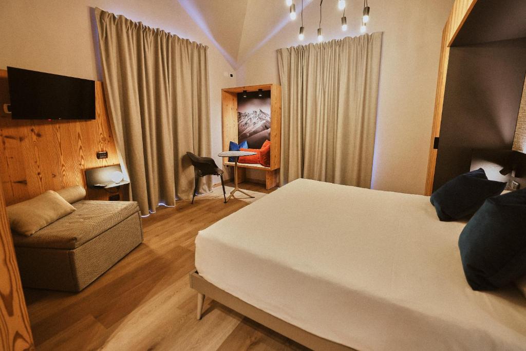 TV a/nebo společenská místnost v ubytování Albergo Meublè Vecchio Scarpone