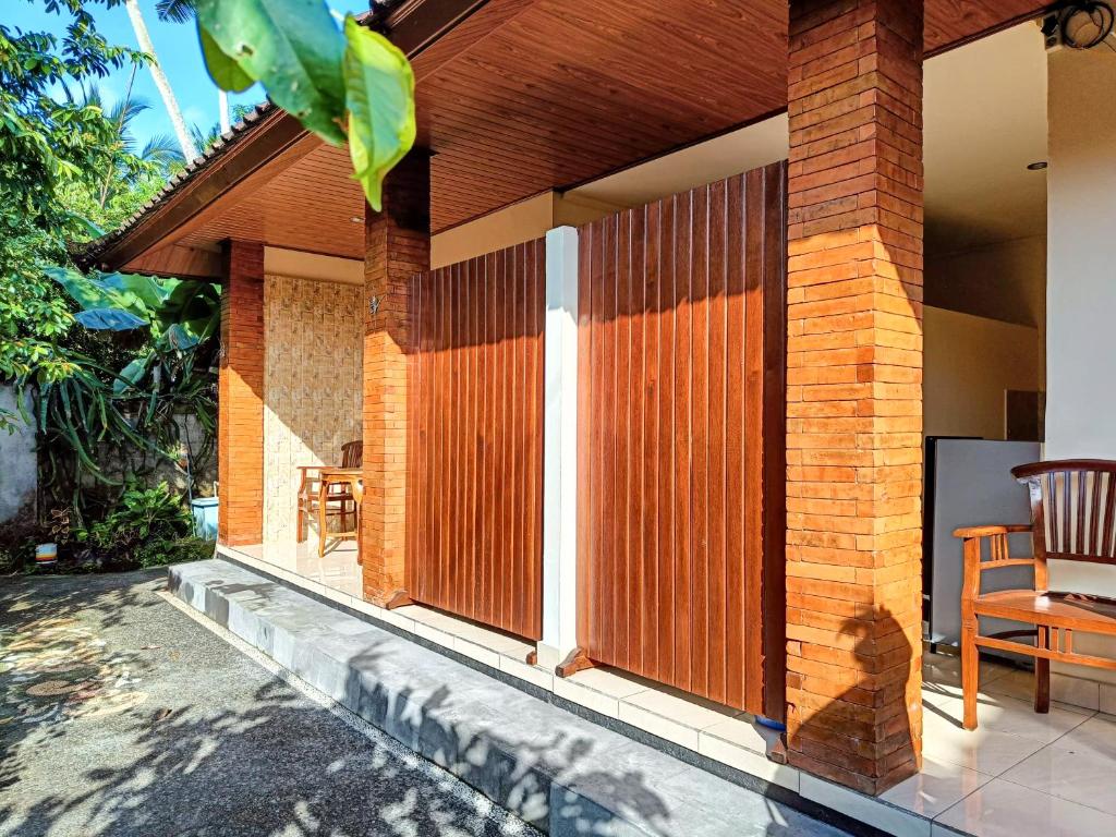 Balkón nebo terasa v ubytování Wisuda Guest House