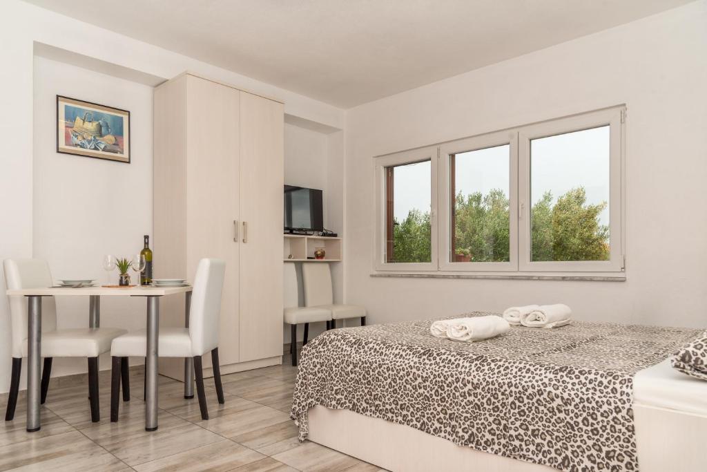 Postel nebo postele na pokoji v ubytování Studio apartment