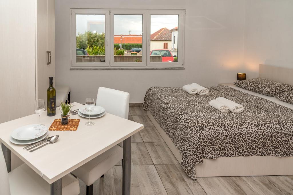 Postel nebo postele na pokoji v ubytování Studio apartment