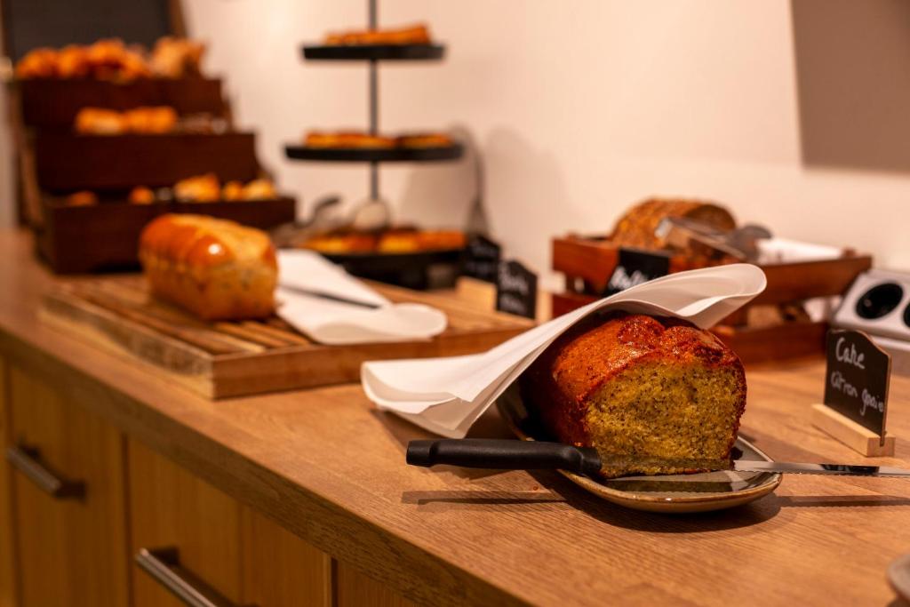 a loaf of bread in a pan on a counter at Mondorf Parc Hotel & Spa in Mondorf-les-Bains