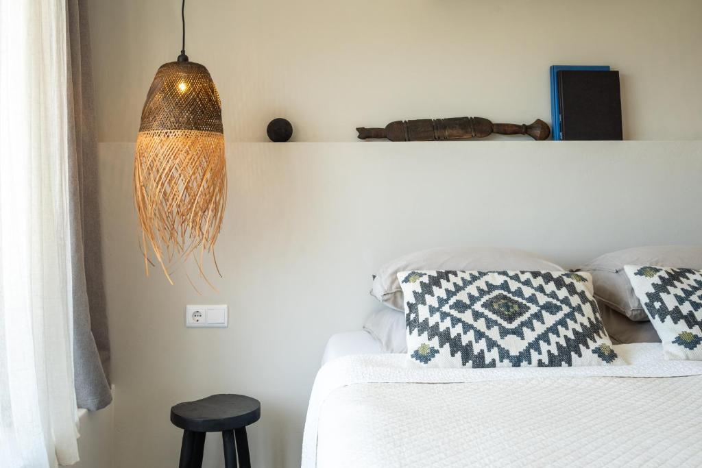 Postel nebo postele na pokoji v ubytování Casa da Adraga