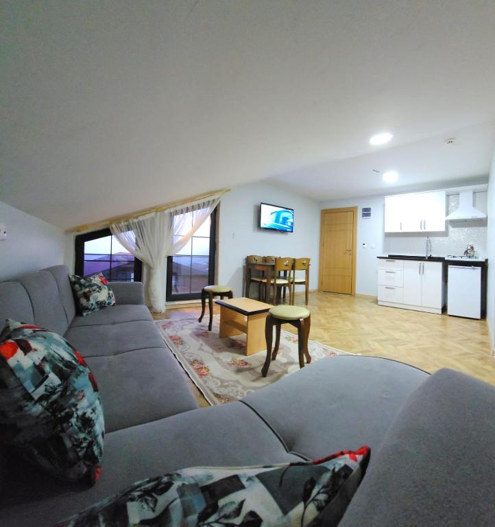 A kitchen or kitchenette at Anemo Suite