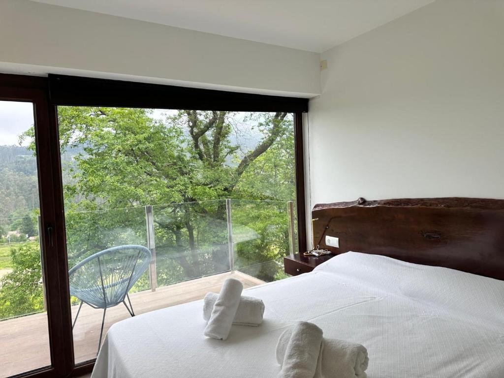 Postel nebo postele na pokoji v ubytování Chalet con piscina Gondomar