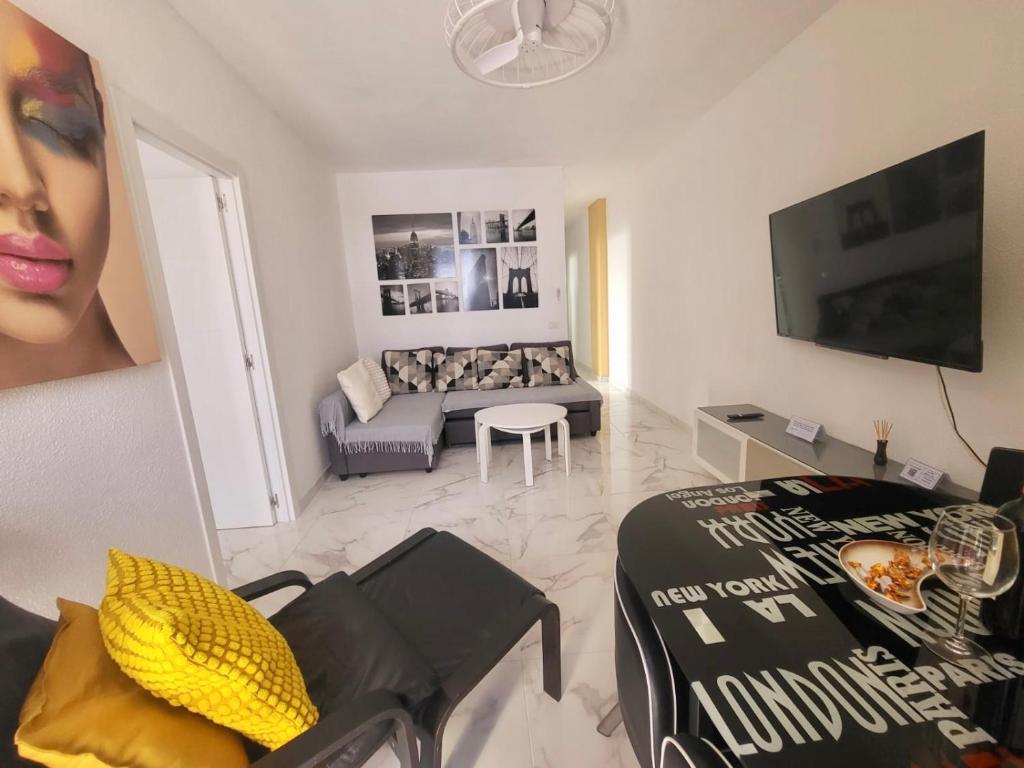 A television and/or entertainment centre at New big flat with balcony 50mts away from beach Parking Optional