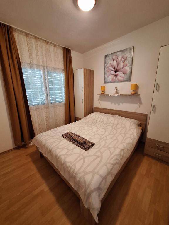 Posteľ alebo postele v izbe v ubytovaní Kuca za odmor Coccoli