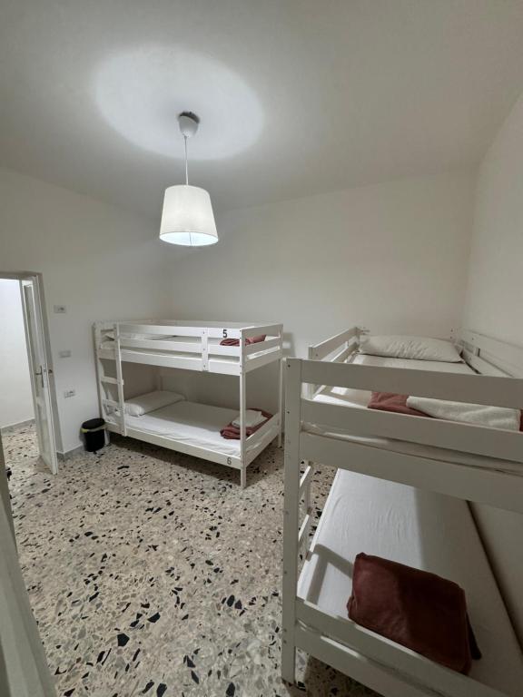 Postel nebo postele na pokoji v ubytování Baraka 24