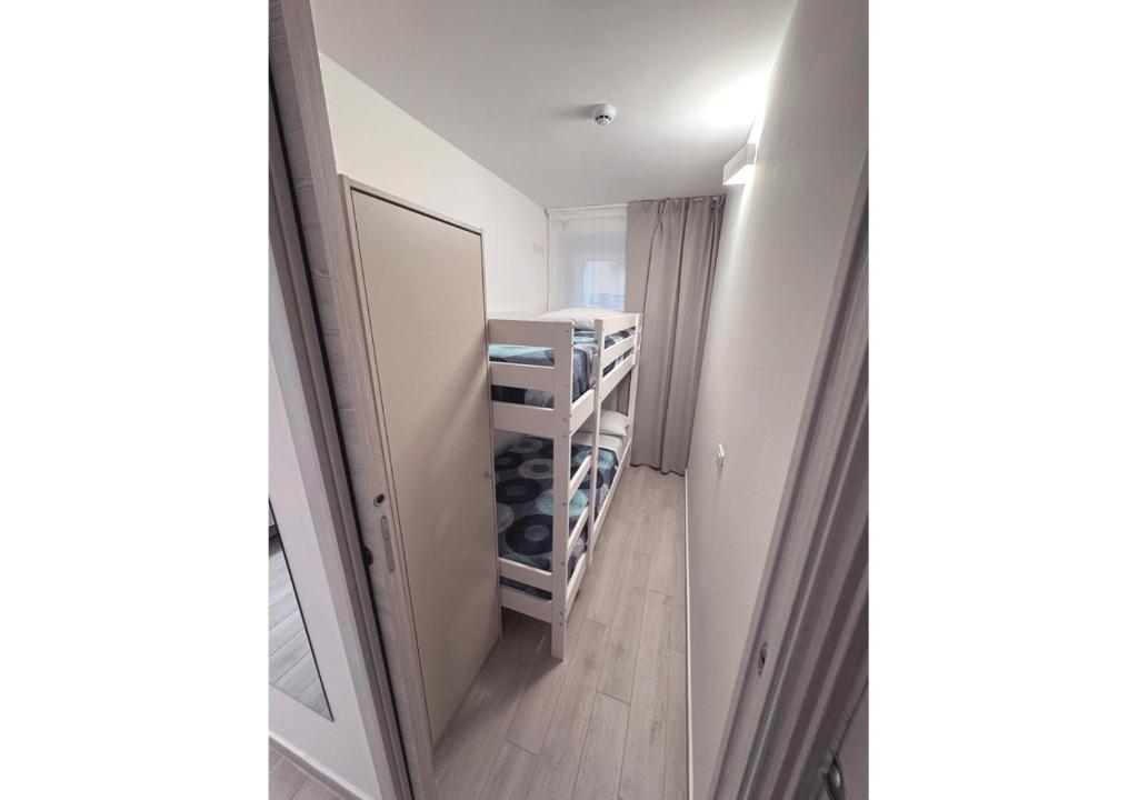 Una cama o camas en una habitación de chiAma Hotel