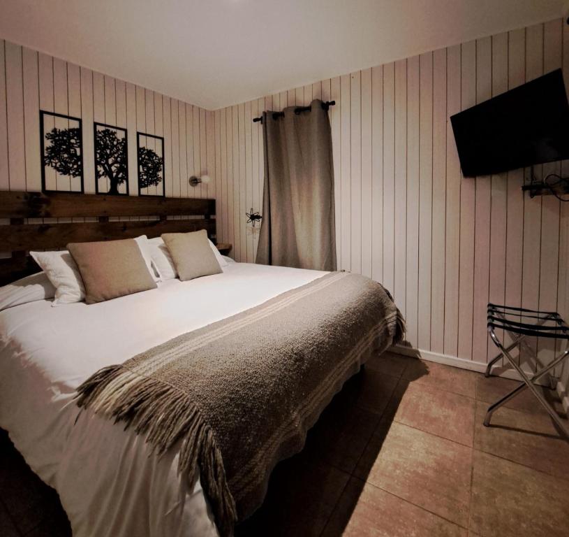Postel nebo postele na pokoji v ubytování Casa Pumahue