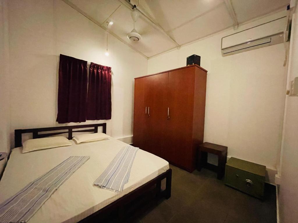 Postel nebo postele na pokoji v ubytování The Long Hostel