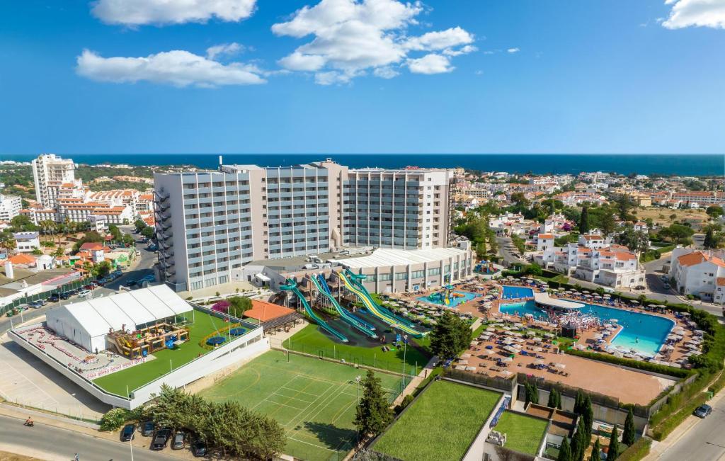 an aerial view of a resort with a roller coaster at Jupiter Albufeira Hotel - Family & Fun - All Inclusive in Albufeira