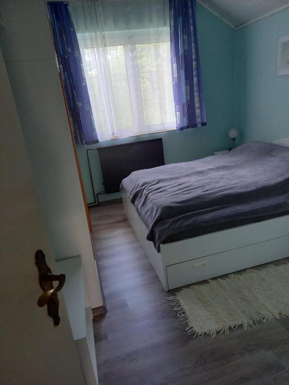 Postel nebo postele na pokoji v ubytování Valéria Vendégház Hévíz