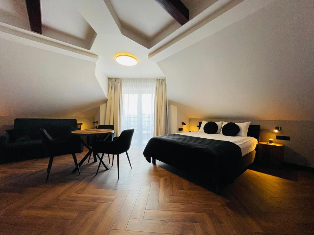 Posteľ alebo postele v izbe v ubytovaní Hotel Millennium