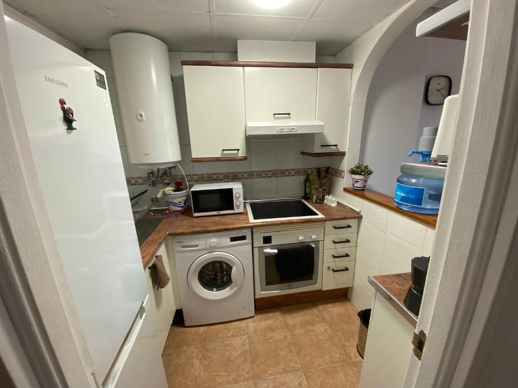 Kuchyň nebo kuchyňský kout v ubytování Marina Apartment Beach