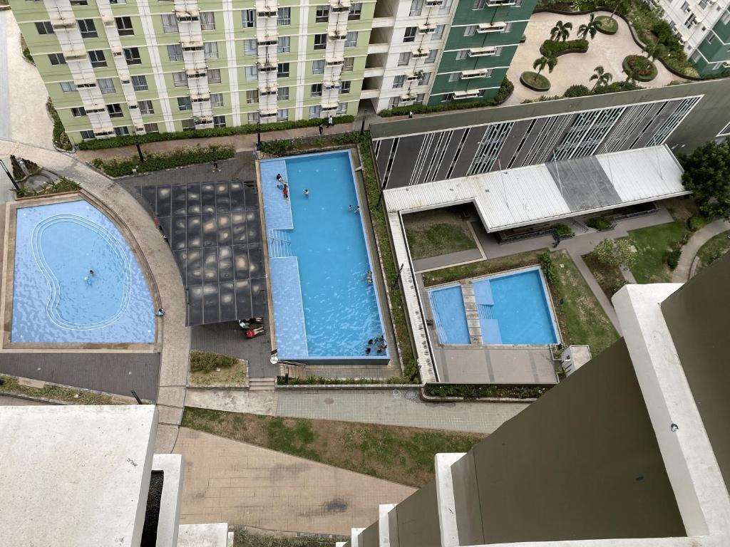Bazén v ubytování Avida Riala 1BR unit- IT Park Cebu City nebo v jeho okolí