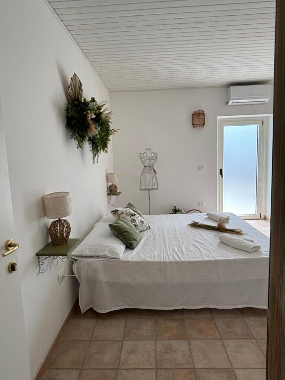 Katil atau katil-katil dalam bilik di Donna Francesca Guest House - Costa dei Trabocchi