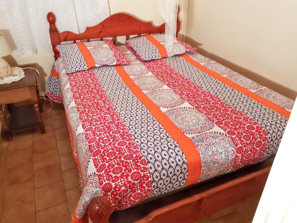 Ένα ή περισσότερα κρεβάτια σε δωμάτιο στο Appartement de 2 chambres avec jardin clos et wifi a Mare Gailard a 2 km de la plage