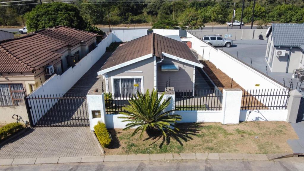 an overhead view of a house with a fence at Bonnie house in Crocodile Valley Estates