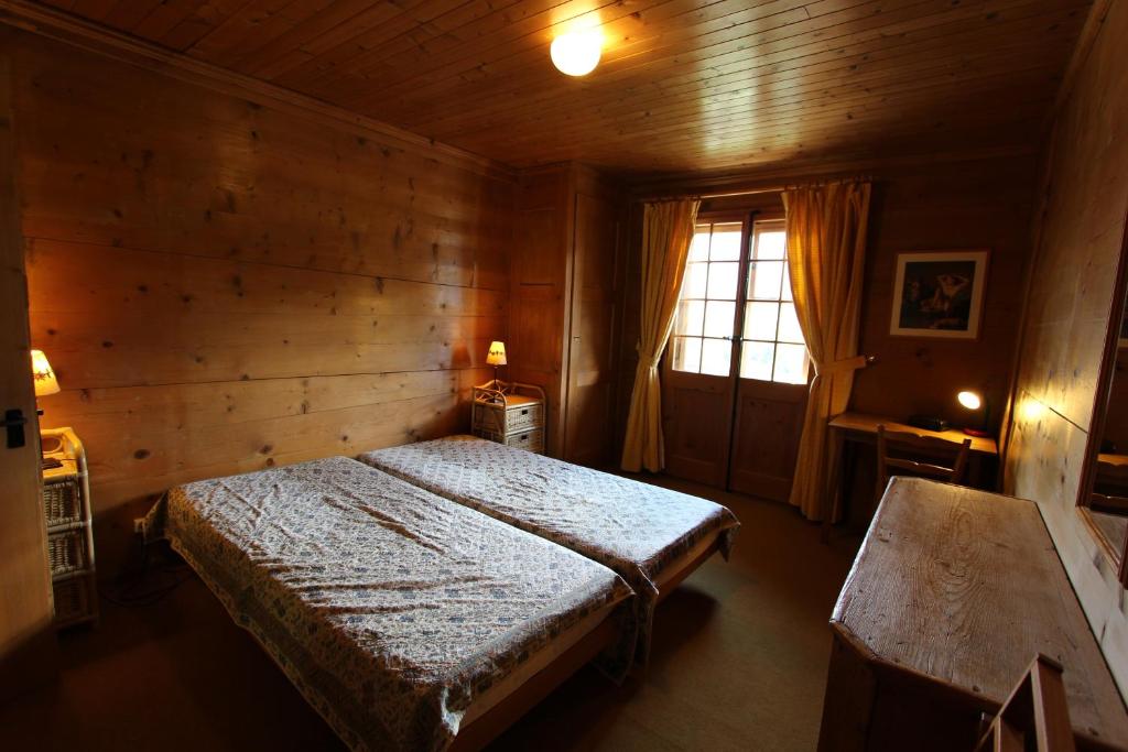 Postel nebo postele na pokoji v ubytování Arnica 2