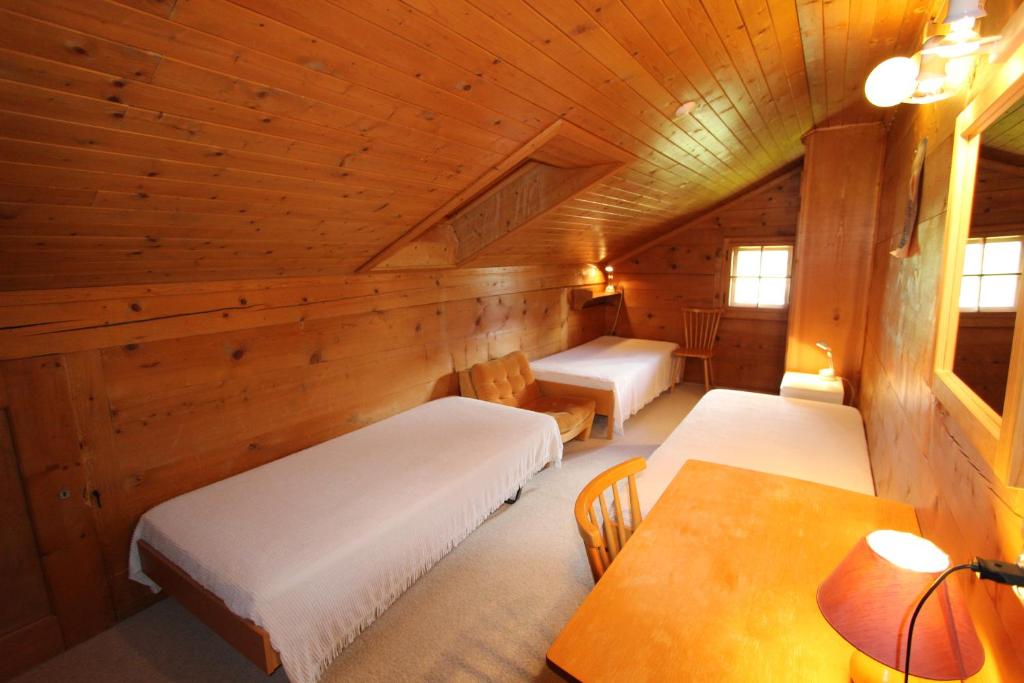 Postel nebo postele na pokoji v ubytování Arnica 2