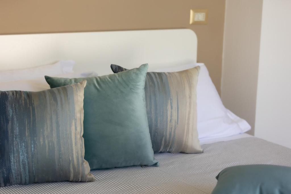 Postel nebo postele na pokoji v ubytování Hotel Adriatica con Piscina
