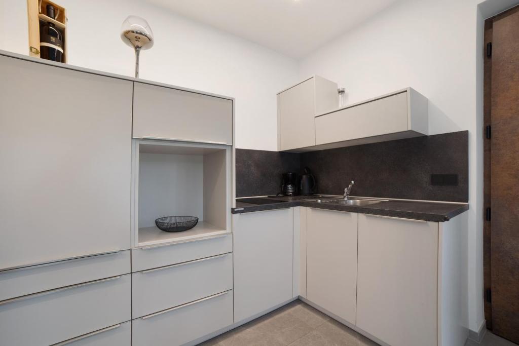 Kuchyň nebo kuchyňský kout v ubytování Haus Nummer 9